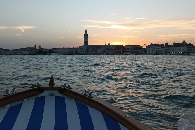 Aperitif at sunset in the Venice lagoon on a private boat. - Stop 1: Arsenale di Venezia and the Serenissima shipbuilding machine