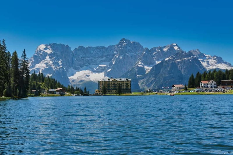 From Venice: The Best of the Dolomites Mountains Day Trip - Lake Auronzo: dam-walk photos and that gate-water moment