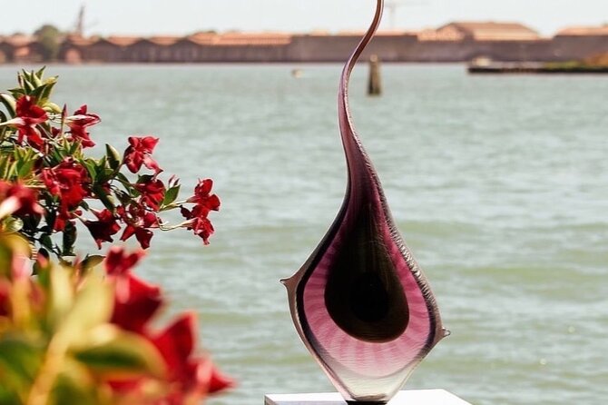 Glass Blowing Demonstration : pickup by wood boat Taxi + local guide - Where you end up: Murano return and dock timing