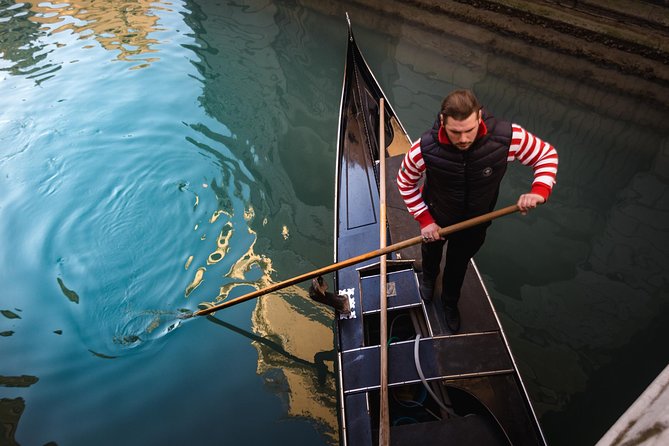 Grand Canal Gondola Experience with Live Commentary™ - Punta della Dogana and the Custom House story at canal junctions