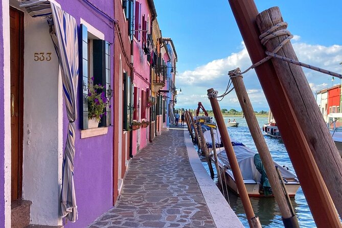 The Secret Corners of Burano - Getting there cleanly: meeting point, voucher, and the high-water reality