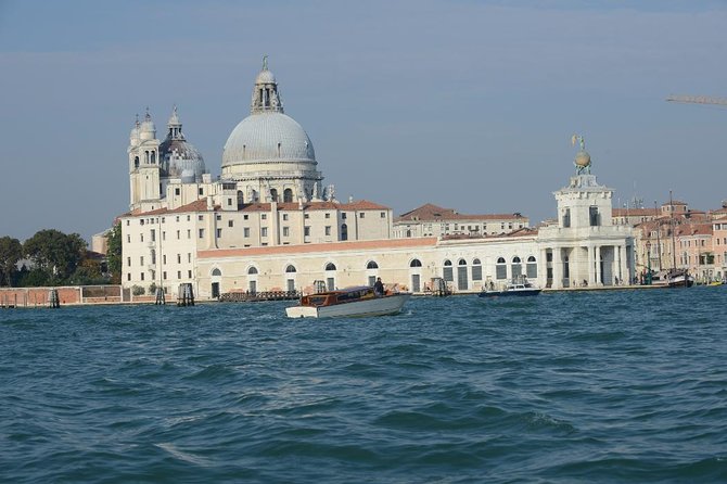 Venice Private Arrival Transfer by Water Taxi: Cruise Port to Central Venice - The private motorboat ride: your first Venice views